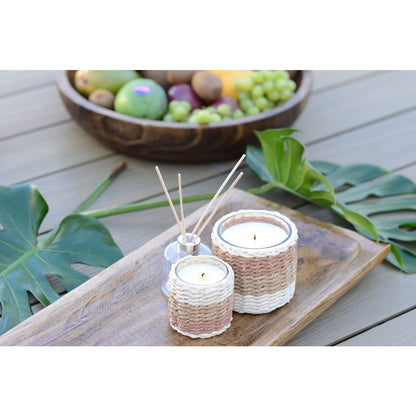 Elegant musk-scented candle in braided glass, perfect for home decoration | CozyVibe