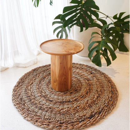 CozyVibe POHON round seagrass rug styled in living room décor

