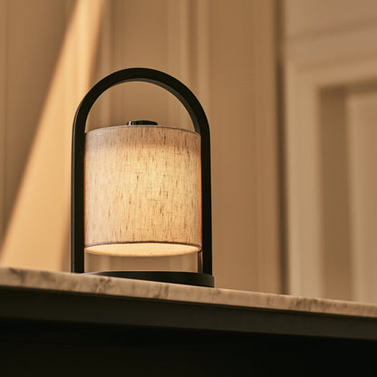 Portable dimmable lamp in black and grey with rechargeable battery